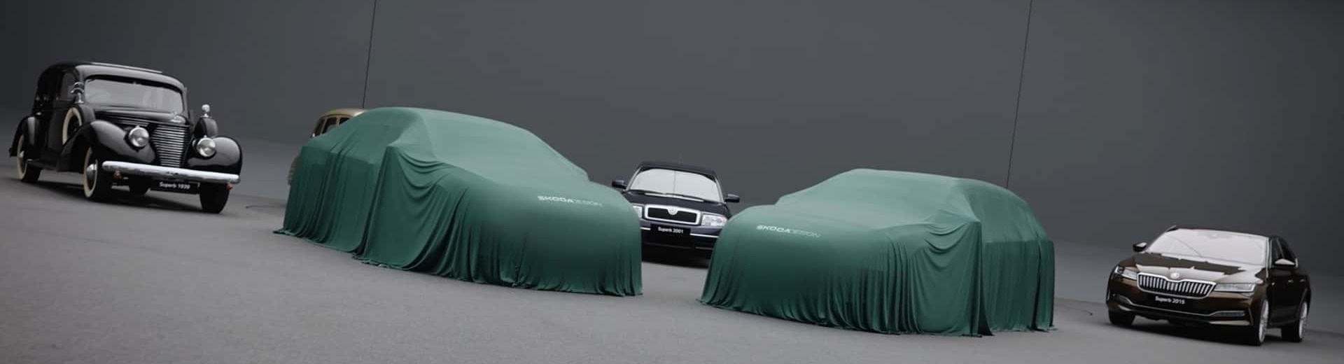 2024 Skoda Superb Teased Under Cover Next To Its Predecessors